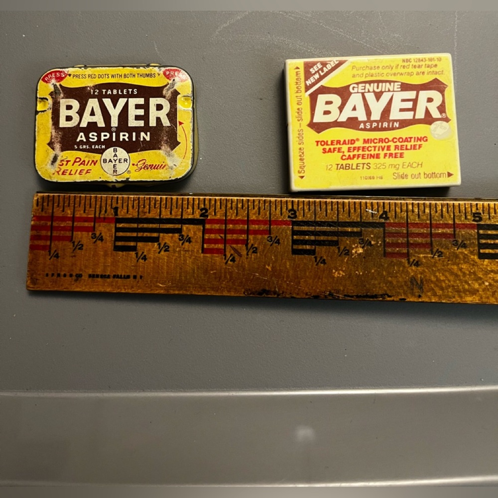 Antique Bayer Aspirin metal case and a plastic case
